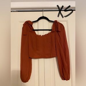 Long sleeve with bows on shoulders - burnt orange